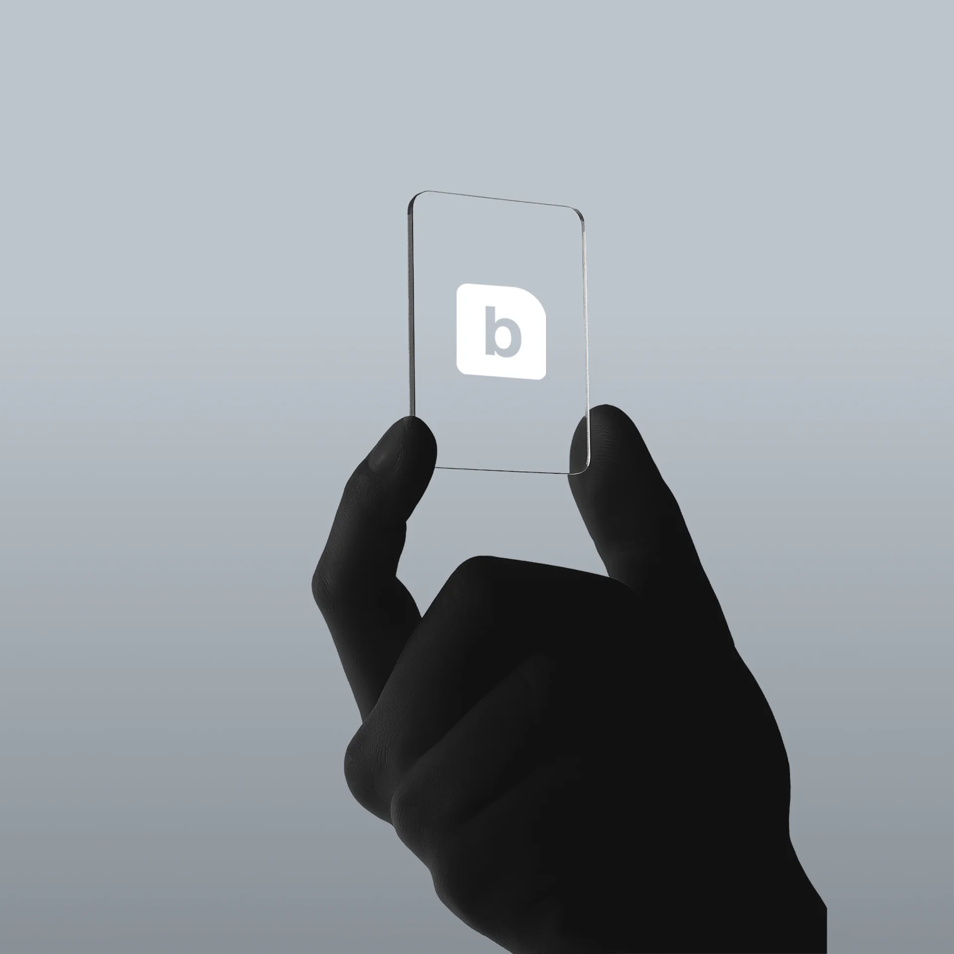Hand holding small transparent rectangle with letter b on gray background