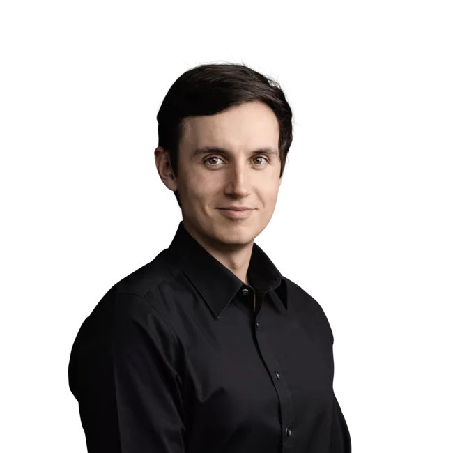 Markus Oberhofer Portrait of young man wearing black shirt against white background