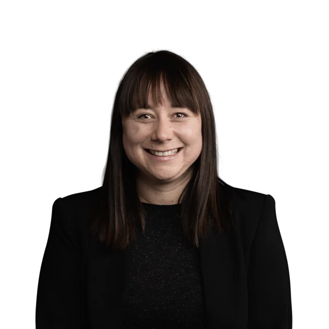 Silvia Verginer Smiling woman with dark hair and black clothing on white background