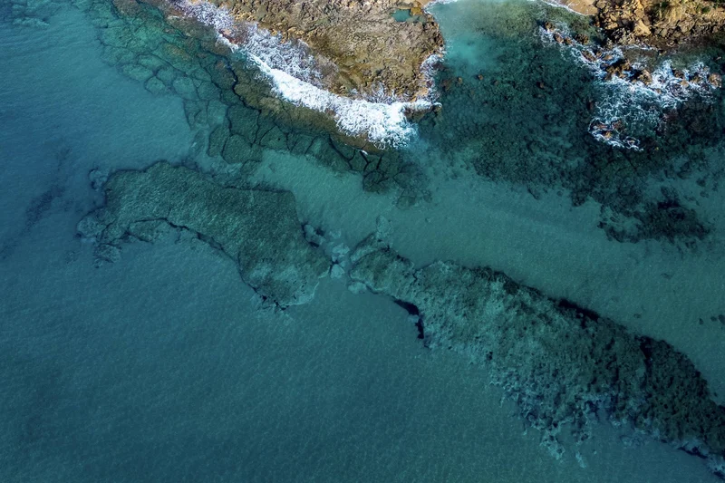 Fabulous seaside holiday in Cilento Aerial view of rocky coastline and clear blue water