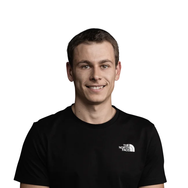 Portrait of a smiling man wearing a black The North Face T-shirt