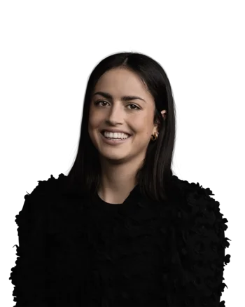 Sara Serra | Customer Success Manager Young woman with long black hair smiling in a black sweater