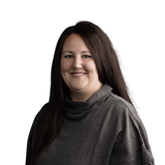 Barbara Reiner Portrait of a woman with long dark hair wearing a gray sweater