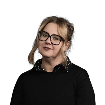 Portrait of a woman with short dark hair and glasses wearing a black shirt